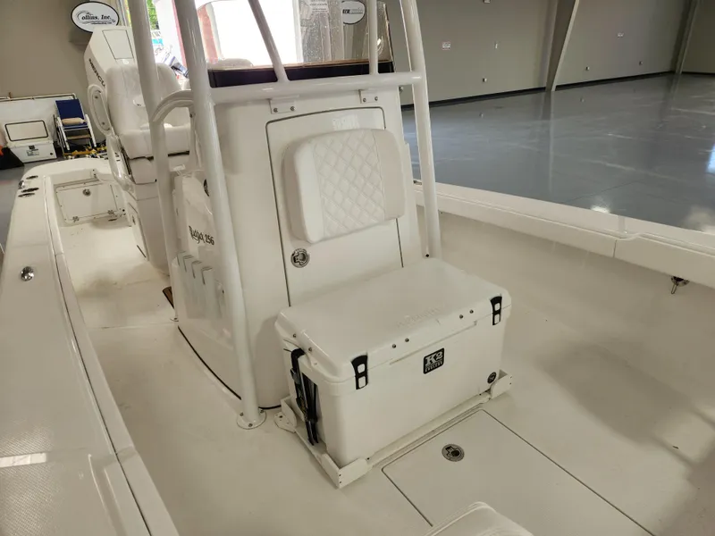Slide: The Image of 2025 BlackJack 256 Coastal boat interior with seating and storage features. - 16