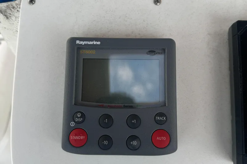 Slide: The Image of Raymarine ST6002 autopilot control on 2001 Beneteau 361 sailboat dashboard. - 9