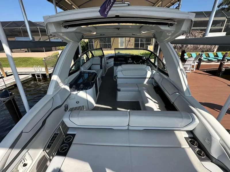 Slide: The Image of 2020 Formula 350 Crossover Bowrider OB with spacious seating and modern design. - 16