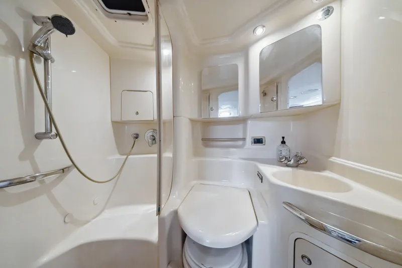 Slide: The Image of Luxurious bathroom in 2003 Sea Ray 380 Sundancer yacht with shower and vanity. - 23