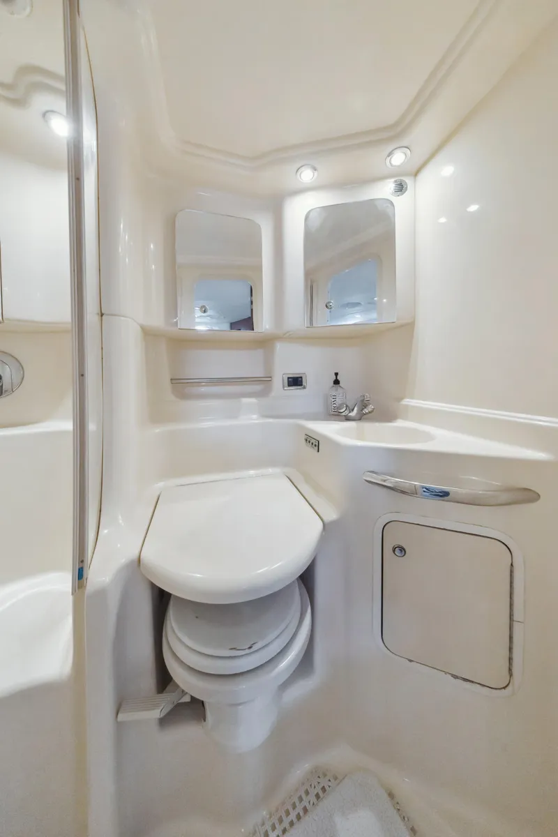 Slide: The Image of Luxurious bathroom in 2003 Sea Ray 380 Sundancer yacht with modern fixtures. - 24