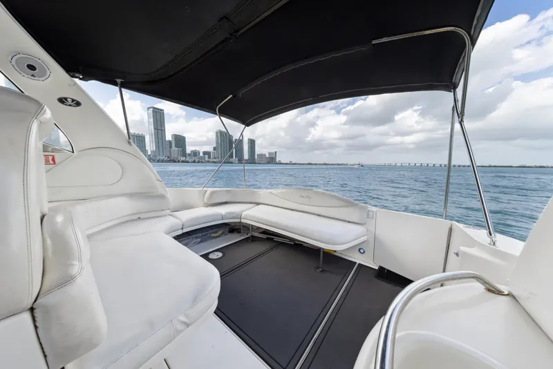 Slide: The Image of 2003 Sea Ray 380 Sundancer boat interior with city skyline and ocean view. - 7