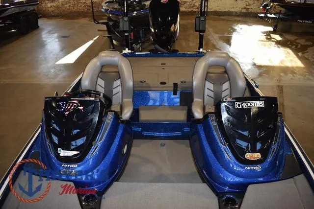 Slide: The Image of 2019 Nitro Z19 boat interior with dual seats and storage compartments. - 15