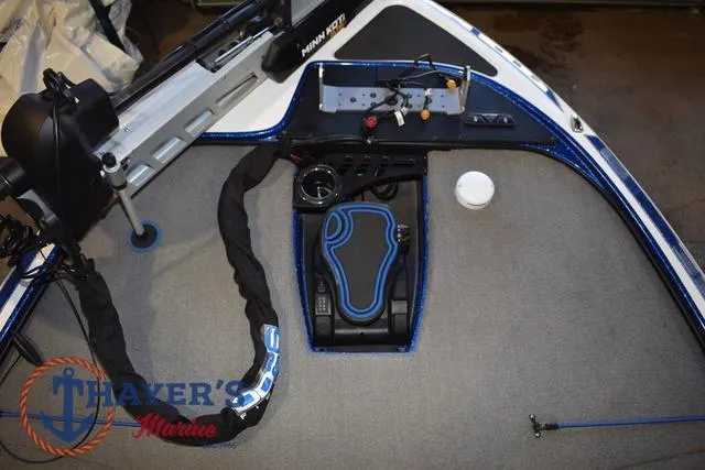 Slide: The Image of 2019 Nitro Z19 boat deck with Minn Kota trolling motor and Thayer's Marine logo. - 16