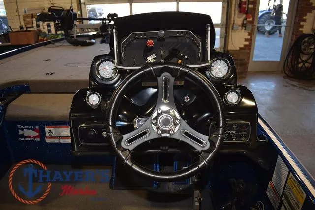 Slide: The Image of Steering console of a 2019 Nitro Z19 boat with gauges and controls. - 17