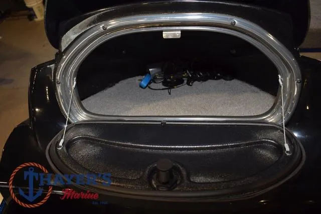 Slide: The Image of Open trunk of a 2019 Nitro Z19 boat, showcasing storage space. - 22