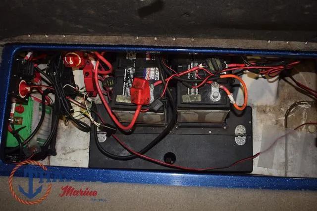 Slide: The Image of 2019 Nitro Z19 boat battery compartment with wiring and connections. - 25