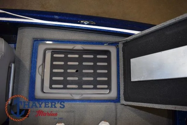 Slide: The Image of 2019 Nitro Z19 boat storage compartment with Thayer's Marine logo. - 27
