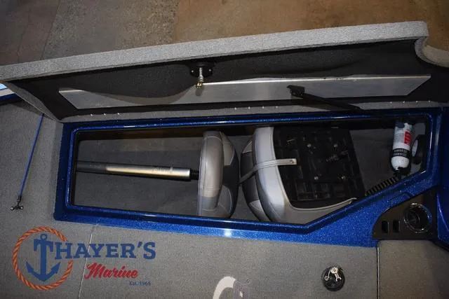 Slide: The Image of 2019 Nitro Z19 boat storage compartment with seats and equipment, featuring Thayer's Marine logo. - 35