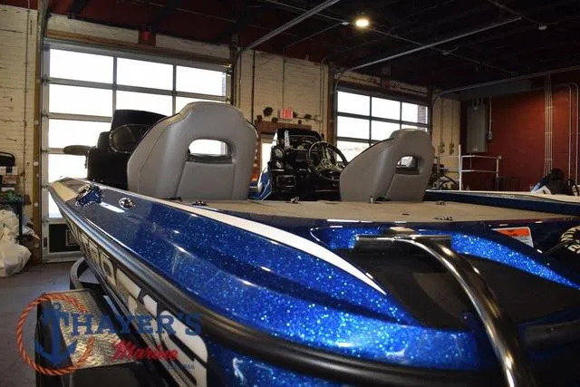 Slide: The Image of 2019 Nitro Z19 boat in a garage, featuring blue metallic finish and dual seating. - 36
