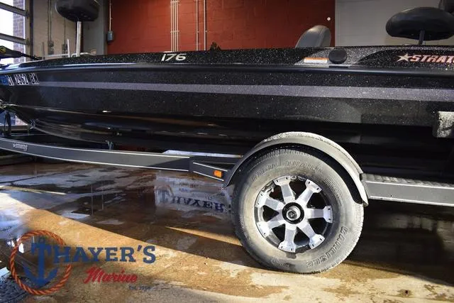 Slide: The Image of 2016 Stratos 176 VLO boat on trailer at Thayer's Marine showroom. - 11