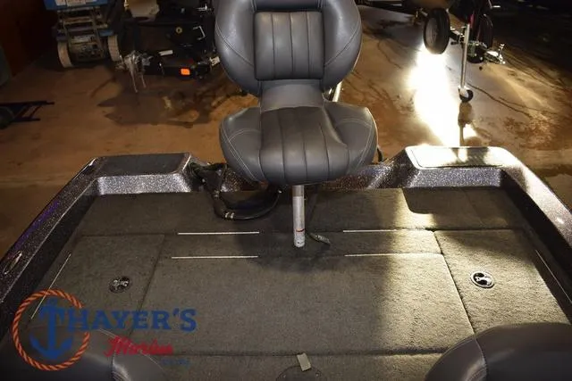 Slide: The Image of 2016 Stratos 176 VLO™ boat interior with swivel seat and carpeted deck. - 17