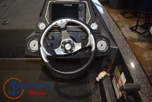 Slide: The Image of 2016 Stratos 176 VLO™ boat dashboard with steering wheel and gauges. - 18