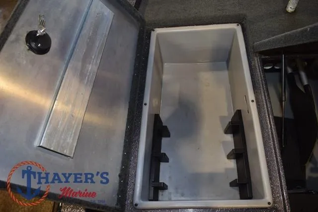 Slide: The Image of Open storage compartment in a 2016 Stratos 176 VLO™ boat by Thayer's Marine. - 25