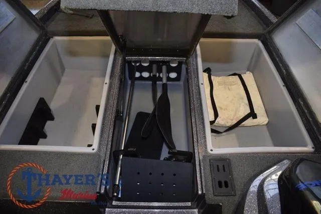 Slide: The Image of 2016 Stratos 176 VLO™ boat storage compartments with equipment and gear. - 27