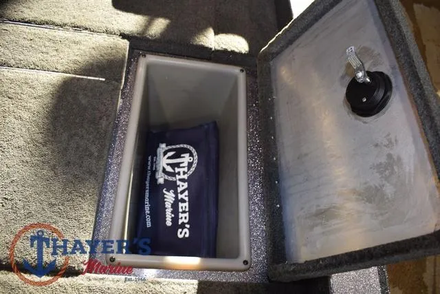 Slide: The Image of 2016 Stratos 176 VLO™ boat storage compartment with Thayer's Marine logo inside. - 32