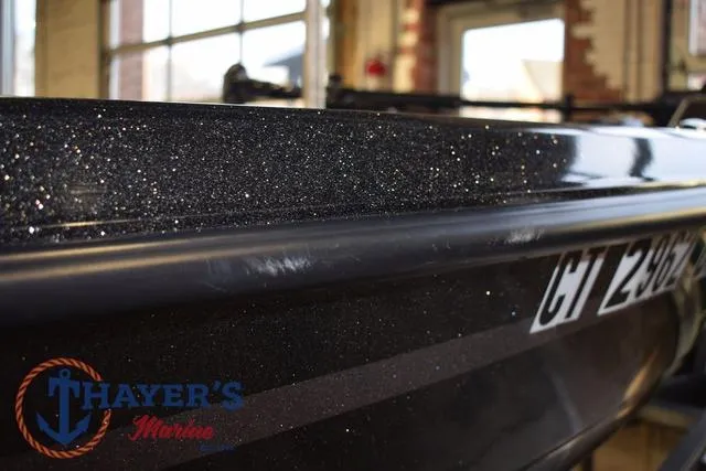 Slide: The Image of 2016 Stratos 176 VLO™ boat with glitter finish at Thayer's Marine showroom. - 38