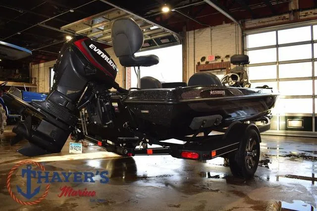 Slide: The Image of 2016 Stratos 176 VLO™ boat with Evinrude motor in a showroom at Thayer's Marine. - 4