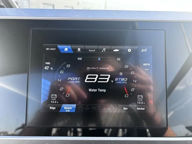 Slide: The Image of Dashboard display of 2023 Yamaha Boats AR250 showing speed, fuel, and water temperature. - 23