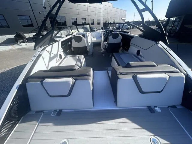 Slide: The Image of 2023 Yamaha Boats AR250 interior with modern seating and sleek design. - 8