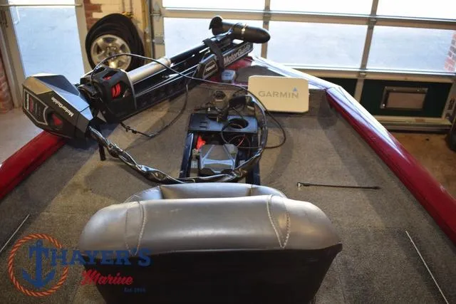 Slide: The Image of 2021 Tracker Pro Team 175 boat interior with Garmin equipment and Minn Kota trolling motor. - 10