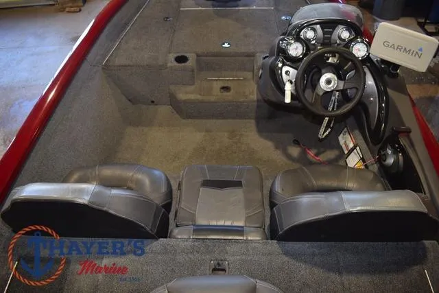 Slide: The Image of 2021 Tracker Pro Team 175 boat interior with Garmin GPS and steering console. - 12