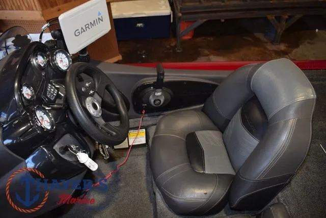Slide: The Image of 2021 Tracker Pro Team 175 boat cockpit with Garmin GPS and comfortable seating. - 14