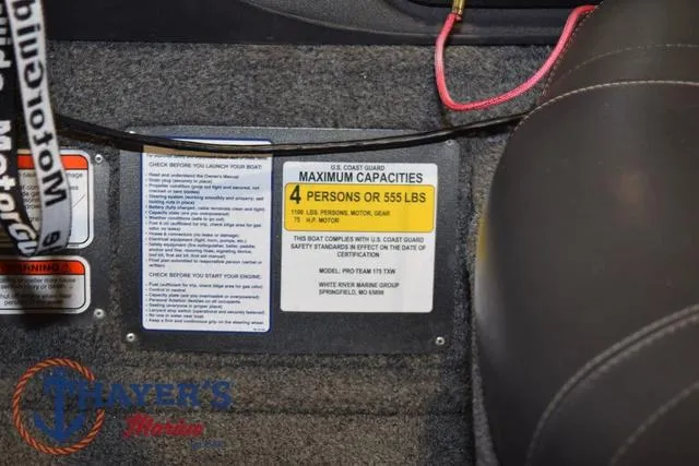 Slide: The Image of 2021 Tracker Pro Team 175 capacity label, seating for 4, maximum 555 lbs. - 16