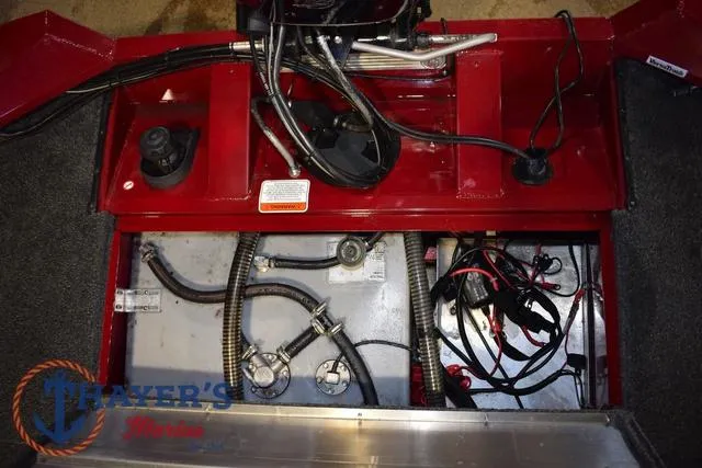 Slide: The Image of 2021 Tracker Pro Team 175 boat interior showing wiring and components. - 26