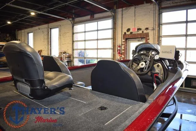 Slide: The Image of 2021 Tracker Pro Team 175 boat interior with Garmin system, displayed at Thayer's Marine showroom. - 7