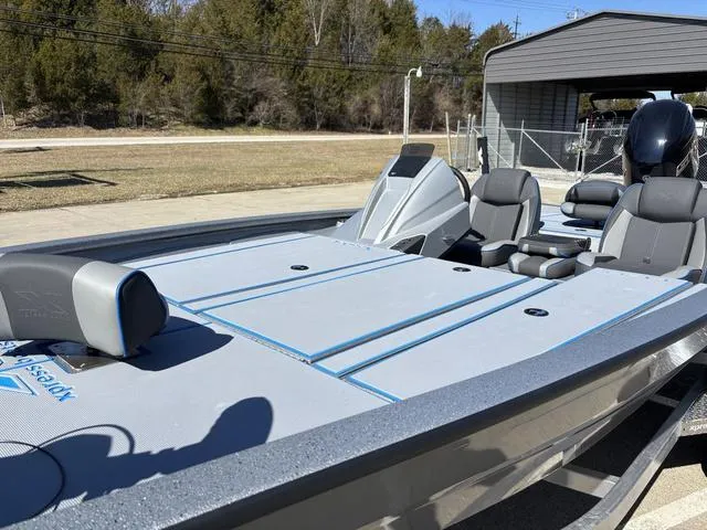 Slide: The Image of 2025 Xpress H20 boat with sleek design, spacious seating, and modern features. - 12