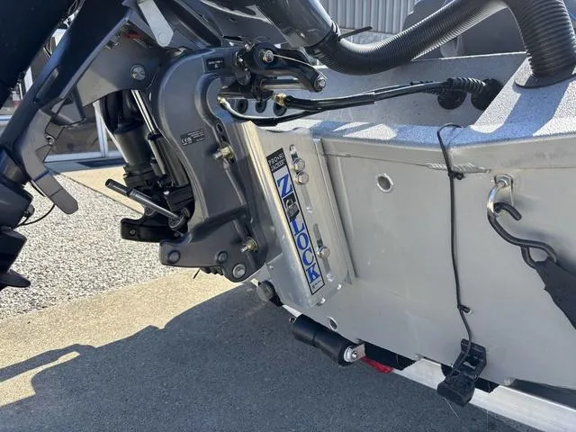 Slide: The Image of Xpress H20 2025 boat motor mount with Z-Lock system, detailed view. - 3