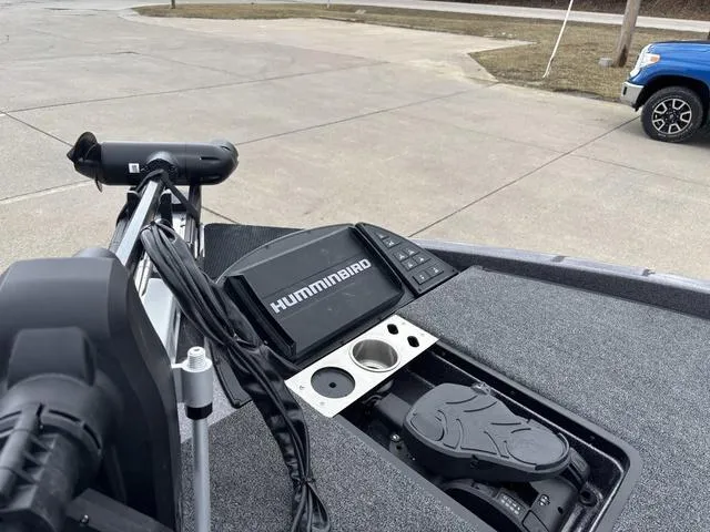 Slide: The Image of 2025 Caymas CX 20 PRO boat dashboard with Humminbird electronics and foot pedal controls. - 12