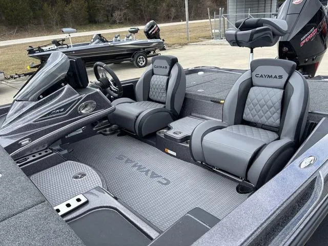 Slide: The Image of 2025 Caymas CX 20 PRO boat interior with sleek seating and modern design. - 14