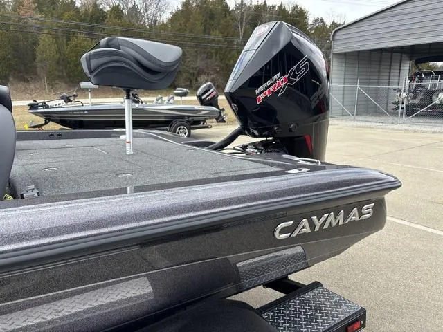 Slide: The Image of 2025 Caymas CX 20 PRO boat with Mercury Pro XS engine, parked outdoors. - 15