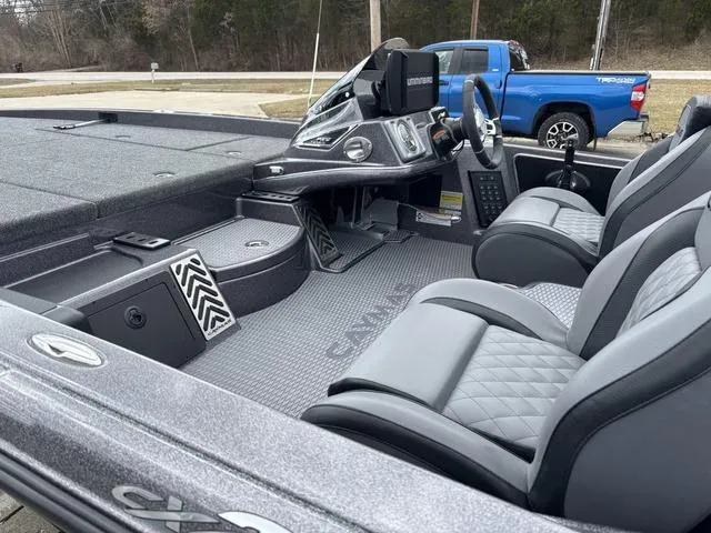 Slide: The Image of 2025 Caymas CX 20 PRO boat interior with modern dashboard and seating. - 16