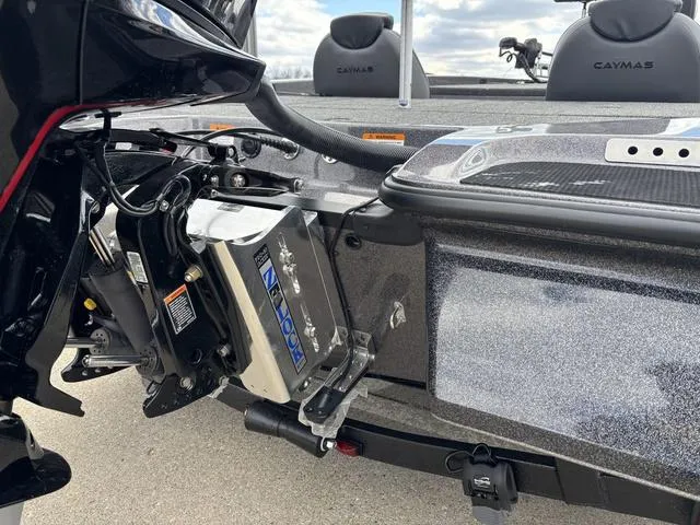 Slide: The Image of 2025 Caymas CX 20 PRO boat with motor and seating detail. - 3