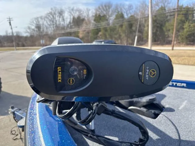 Slide: The Image of Close-up of Ultrex motor on 2008 Skeeter ZX200 boat, outdoors. - 9