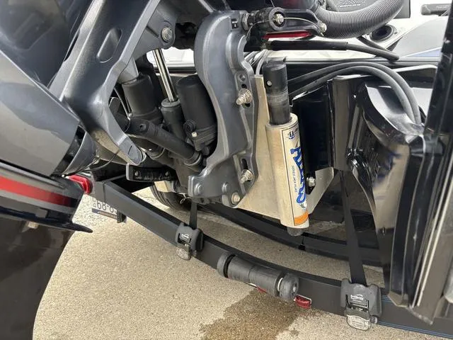 Slide: The Image of 2021 Skeeter FXR21 Limited boat suspension and shock absorber detail. - 3