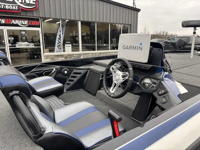 Slide: The Image of 2021 Skeeter FXR21 Limited boat interior with Garmin navigation system and sleek seating. - 6