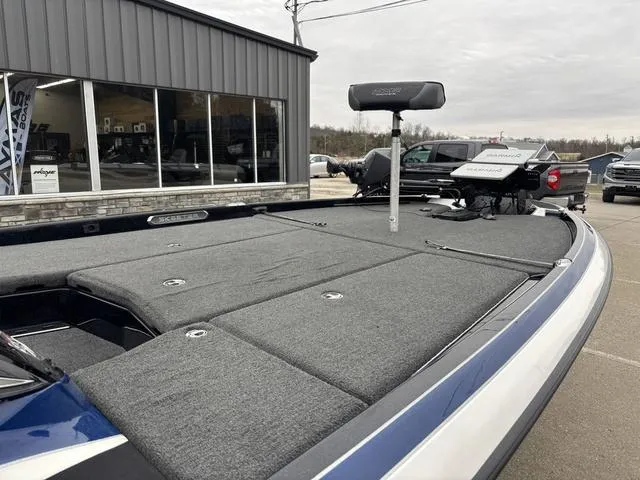 Slide: The Image of 2021 Skeeter FXR21 Limited boat with spacious deck and modern features. - 8