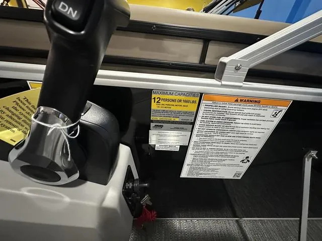 Slide: The Image of 2025 Godfrey Pontoons Xperience 2286 SFLX capacity label, 12 persons or 1660 lbs. - 12