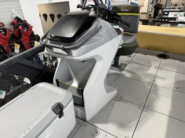 Slide: The Image of 2025 Sea-Doo Switch™ Fish 21 - 230 hp Painted, interior view with console and seating. - 17
