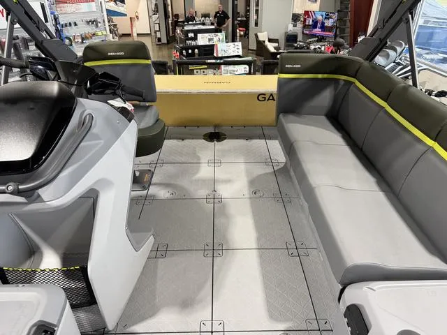 Slide: The Image of 2025 Sea-Doo Switch Fish 21 interior with seating and helm, showcasing modern design. - 22