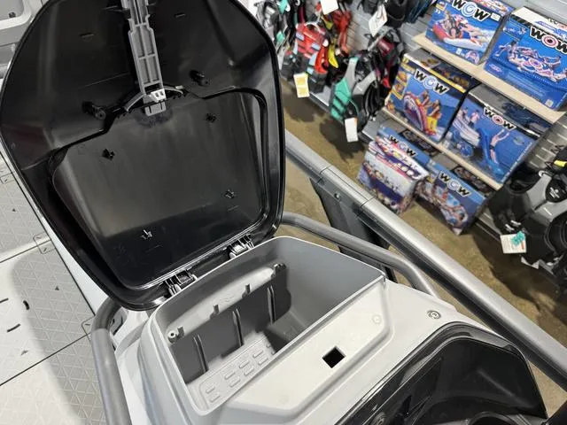 Slide: The Image of Open storage compartment of 2025 Sea-Doo Switch™ Fish 21, showcasing interior space. - 3