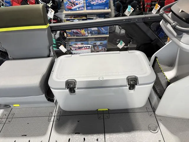 Slide: The Image of 2025 Sea-Doo Switch Fish 21 interior with storage compartment and seating. - 15