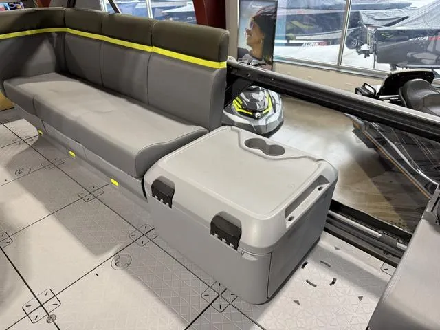 Slide: The Image of 2025 Sea-Doo Switch Fish 21 interior with seating and storage compartment. - 18
