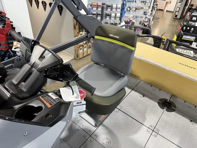 Slide: The Image of 2025 Sea-Doo Switch™ Fish 21 - 230 hp Painted, interior view with steering and seating. - 23