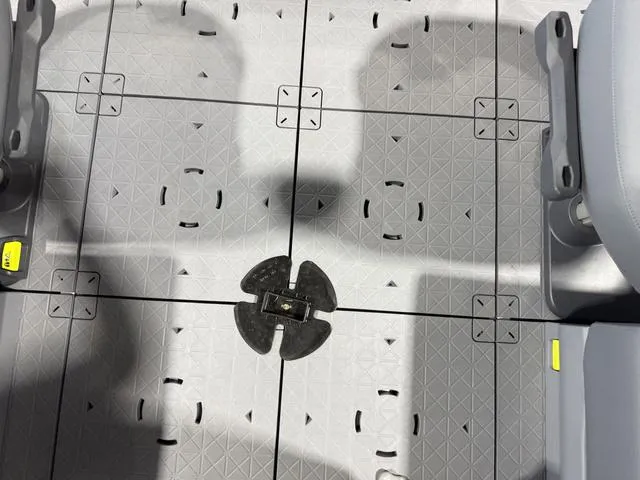 Slide: The Image of 2025 Sea-Doo Switch™ Fish 21 deck, featuring modular seating and textured flooring. - 10