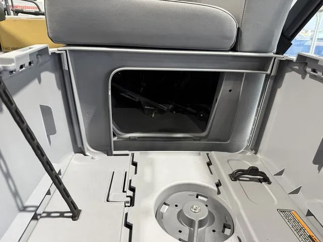 Slide: The Image of Interior storage compartment of 2025 Sea-Doo Switch™ Fish 21, showcasing practical design features. - 20